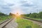 Railroad against beautiful sky at sunset. Industrial landscape w