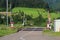 Railroad crossing with gates in German countryside