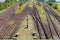 Railroad crossing on gravel in sunlight