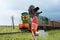 Railroad crossing signs and the approaching train