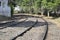 Railroad curve, with masonry buildings and green vegetation, Brazil, South America