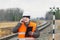 Railroad employee with phone