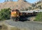 Railroad locomotives start up the grade into Tehachapi Pass, toward famous Tehachapi Loop, California