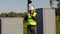 Railroad maintenance worker talking on a walkie-talkie