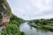 Railroad and mountain views by the river and the sky behind Thailand.