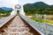 Railroad passes the white bridge at Lamphun, Thailand