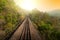 Railroad passing ancient steel bridge over a gorge