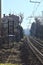 Railroad passing in a village in the italian countryside on a sunny day in winter