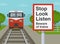 Railroad safety rules and tips. Stop Look Listen warning sign for pedestrians on railway platform while train is approaching.