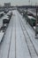 Railroad station in winter. Freight cars are covered with snow. The concept of railroad transportation