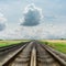 Railroad to horizon in dramatic clouds