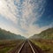 Railroad to horizon and dramatic sky