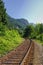 Railroad track in countryside mountain area