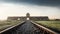 Railroad Track and the Gate of Death - Entrance of Auschwitz II - Birkenau, former Nazi Concentration and Extermination Camp