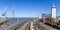 Railroad track and lighthouse in the harbor of Harlingen