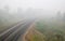 Railroad track and mist