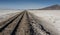 Railroad tracks across Salar de Chiguana in Sud Lipez Altiplano - The Ferrocarril de Antofagasta - Bolivia