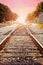 Railroad tracks against beautiful sky at sunset