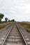 Railroad tracks through farmland