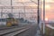 Railroad Tracks, Maintenance Train and Overhead Lines at Sunset