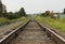 railroad tracks, a road for trains going into the distance