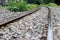 Railroad tracks and rocks in Thailand, metal railway of train.