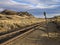 Railroad tracks running through the desert