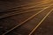 Railroad tracks shine at sunset in Kansas