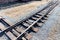 Railroad tracks on sunny summer day. Railway arrow switch tracks