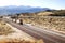 Railroad tracks a train in the American desert