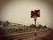 Railroad traffic pole. Picture in vintage and sepia tone.