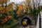 Railroad tunnel and autumn color in Charles Village, Baltimore, Maryland