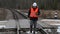 Railroad worker take picture on railway crossing