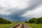 Rails. nature. overcast sky