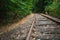 The rails of the railway go into the distance.