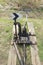 Railway arrow in black with a lever and pointer in Russia. The device for the transfer of rails at intersections for