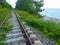 Railway, beach and green grass