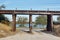 Railway bridge across a dirt road