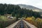 Railway bridge across a valley in the mountains in the typical Ukrainian village of Vorokhta near Hoverla, Carpathians