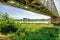 A railway bridge and the castle of Sully Sur Loire in the background.