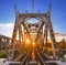 Railway bridge at dawn. Industrial summer landscape.