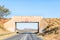 Railway bridge frames a mountain scene south of Windhoek
