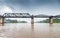 Railway Bridge in the rain cloud, River Kwai, Kanchanaburi, Thailand