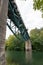 The railway bridge seen from the backwaters on the river. Steel river crossing