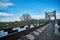 Railway Bridge view. Railroad Path leading into the distance of the blue sky.