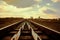 Railway Bridge view. Railroad Path leading into the distance of the blue sky.