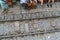 Railway cafe. People drink coffee or walking on railways waiting for train to arrive on railway road in Hanoi, Vietnam