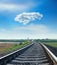 railway closeup to horizon and cloud in blue sky