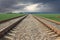 Railway in cloudy weather on background of cloudy sky