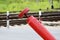 Railway crossing, anti-RAM devices. Red crossing fence device that automatically lifts plates on the road, prohibiting the passage